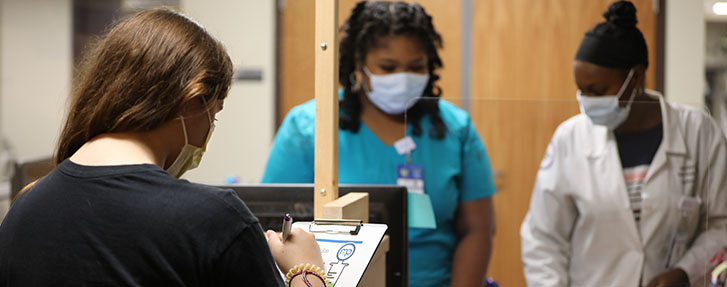 students in health lab w masks