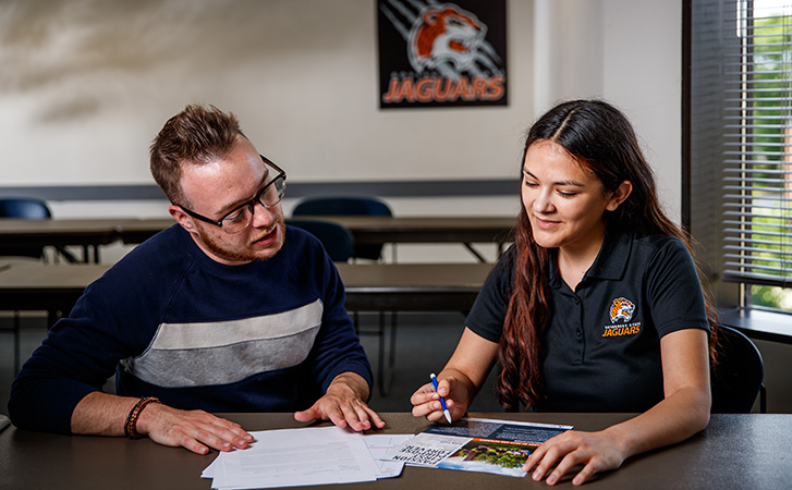 Academic advisor assisting a student