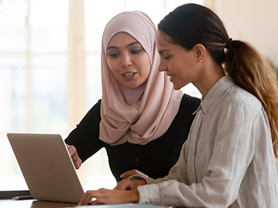 2 Female Students Studying