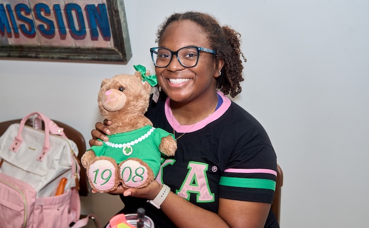 Person holding a teddy bear Person holding a teddy bear